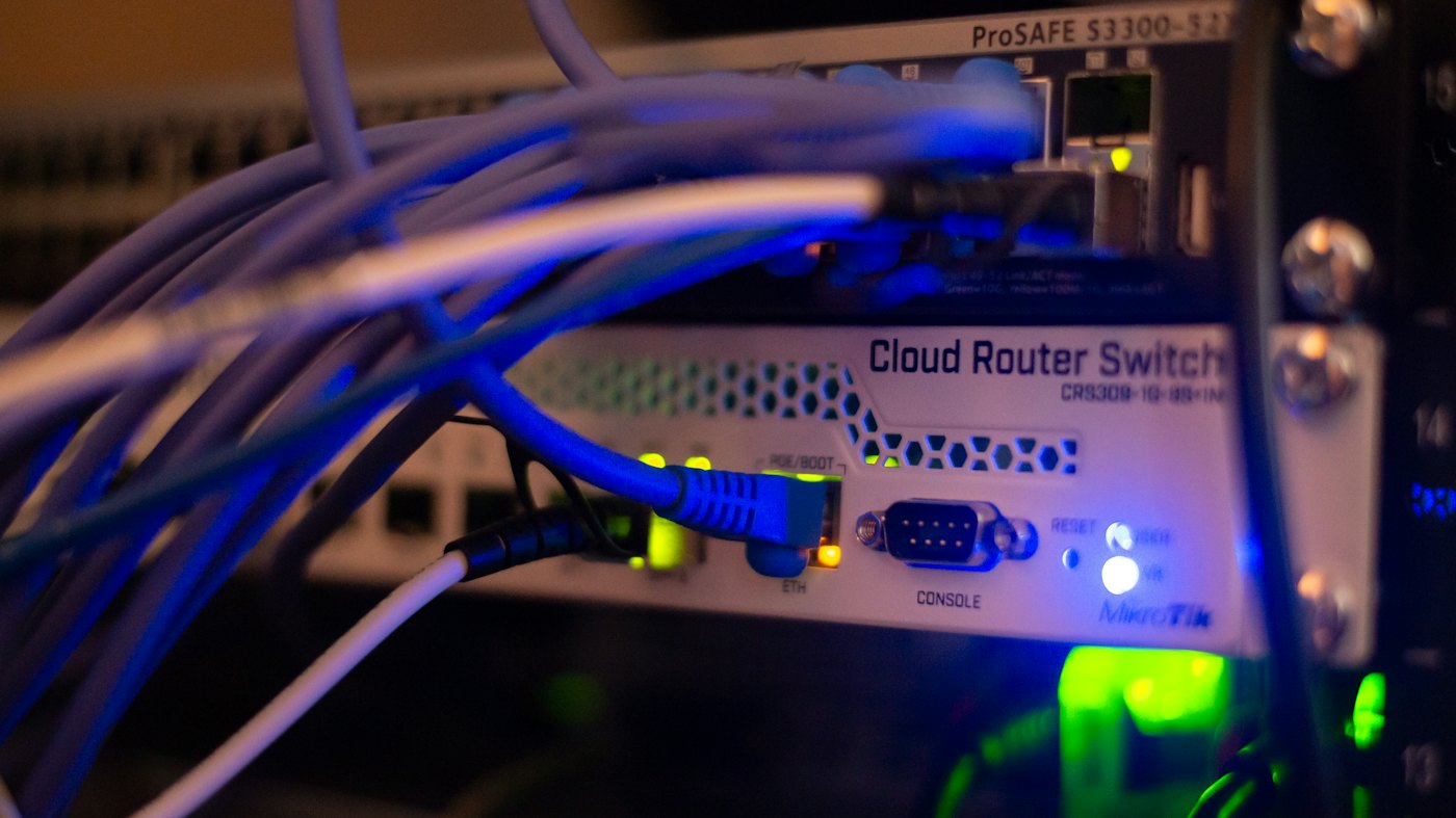 Network cables connected to a cloud router switch in an equipment rack